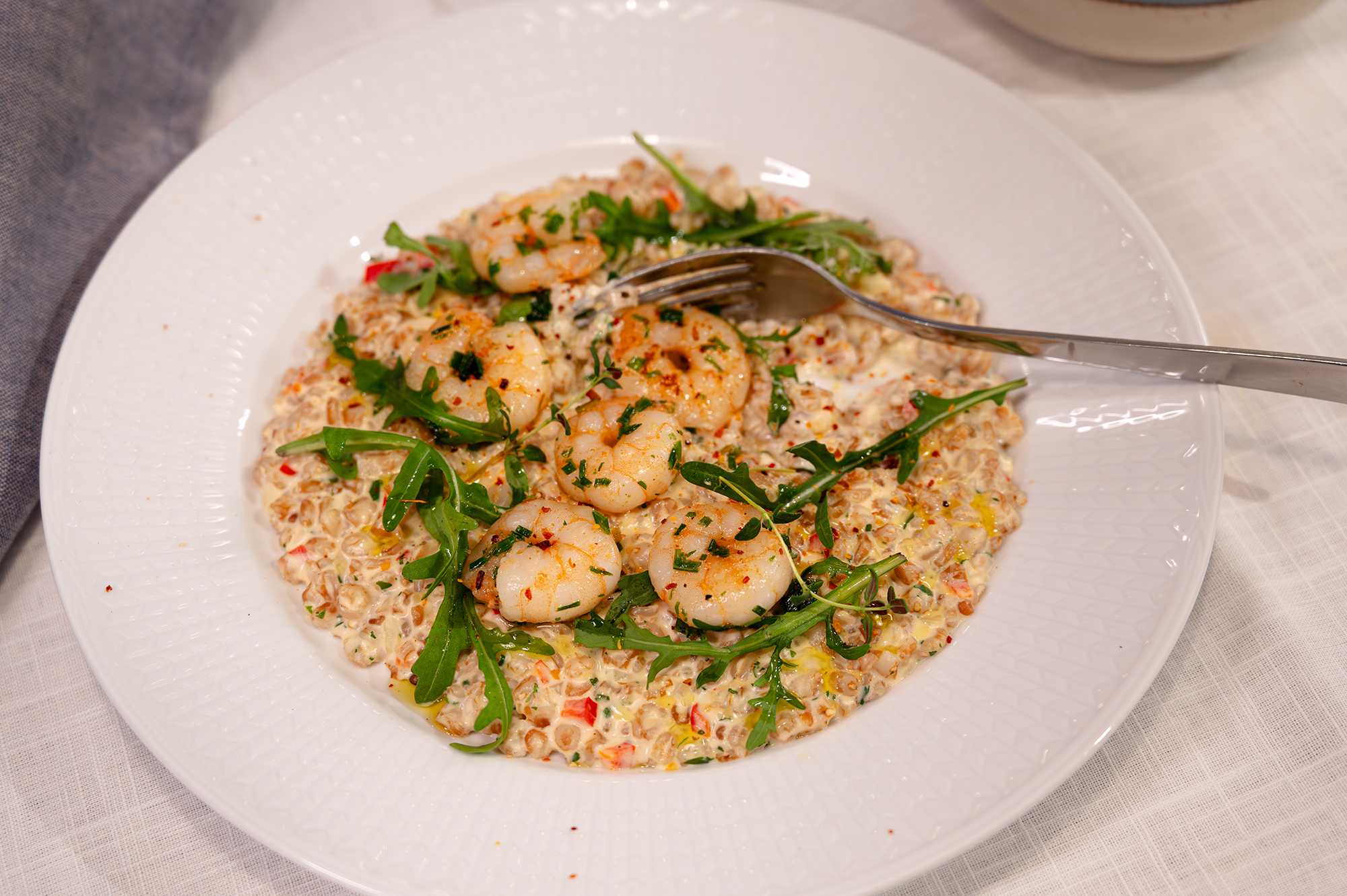Krämig matvete med scampi och citron